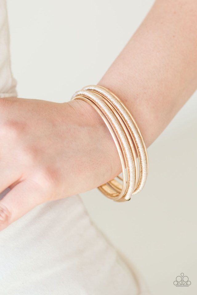 pay-a-hefty-shine-rose-gold-bracelet-paparazzi-accessories