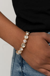 Still GLOWING Strong - Gold Bracelet - Paparazzi Accessories